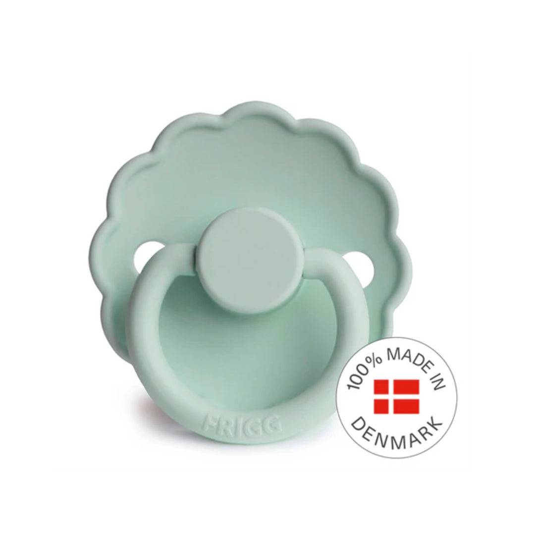 Silicone pacifier with '100% Made in Denmark' label on a white background