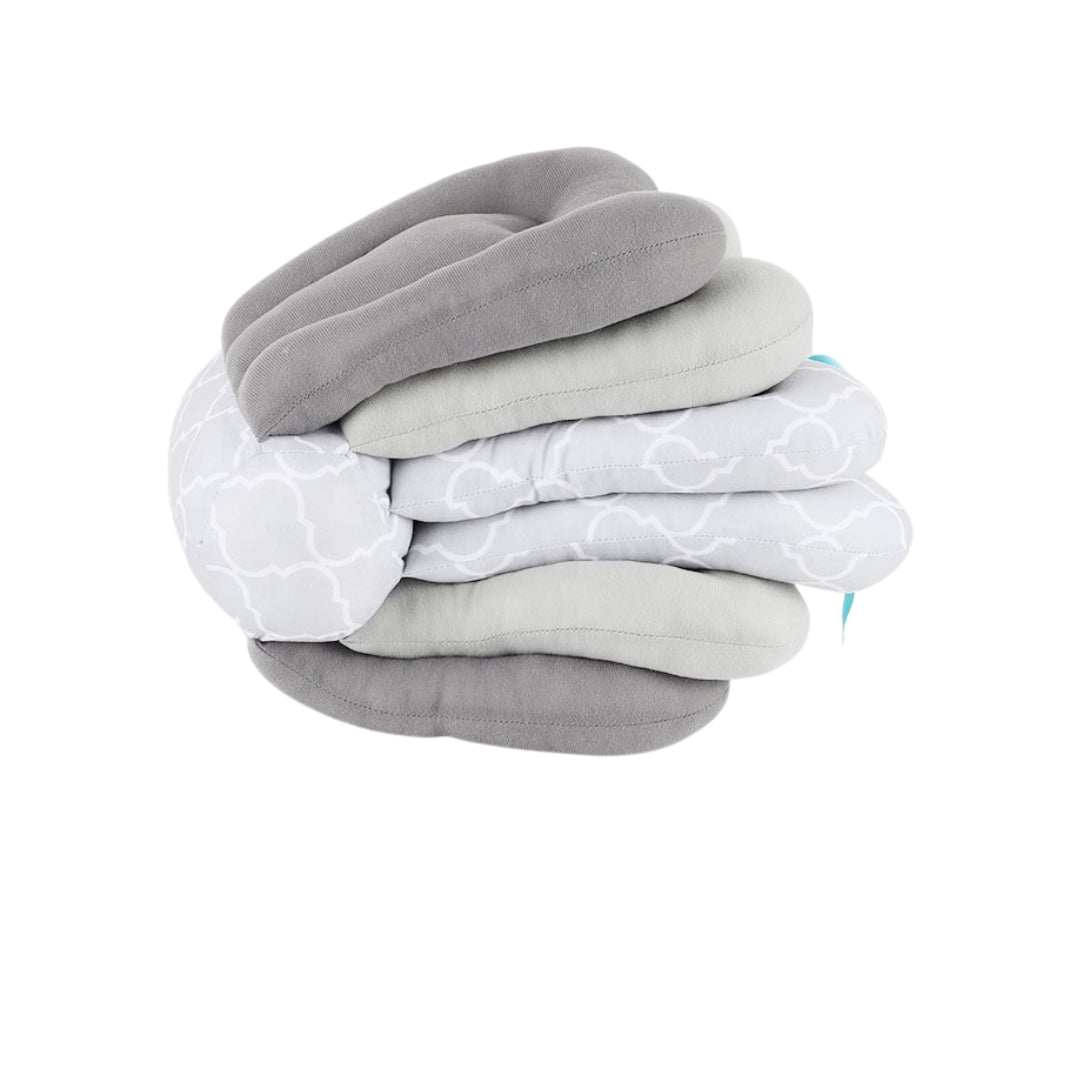 Stack of gray and white baby Pillow on a white background