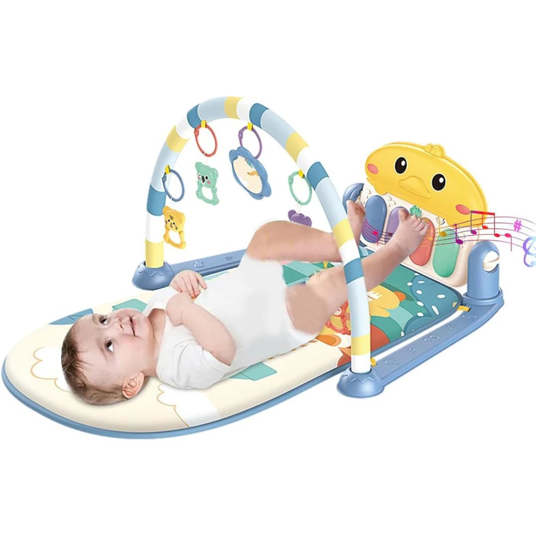 Baby Playing on his soft play mat with piano