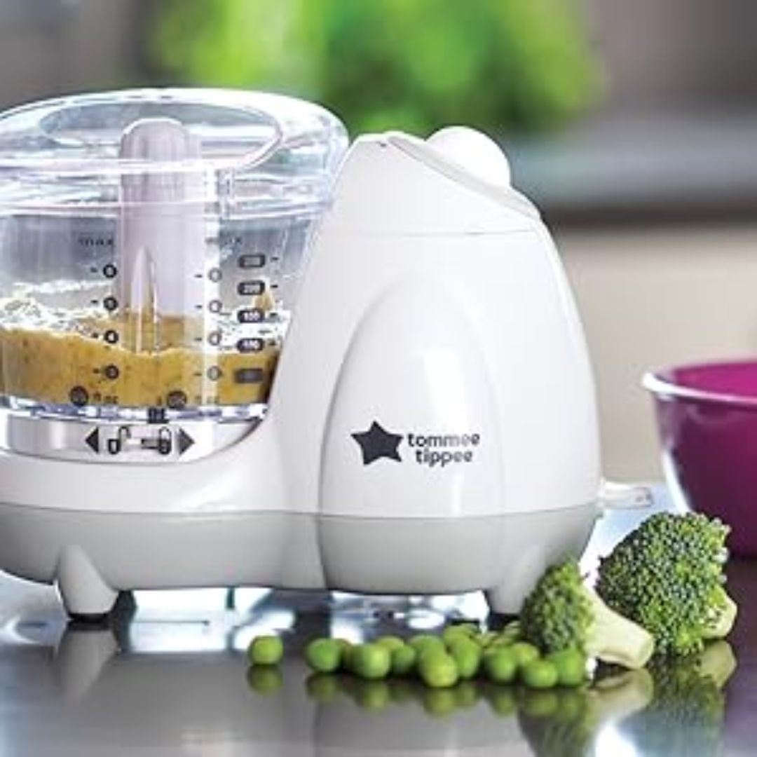 Tommee Tippee baby food processor with ingredients on a kitchen counter