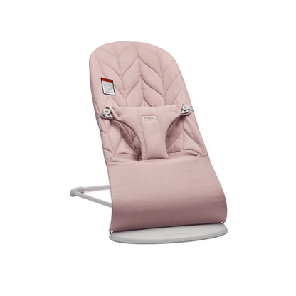 BabyBjorn Pink baby bouncer chair on a white background