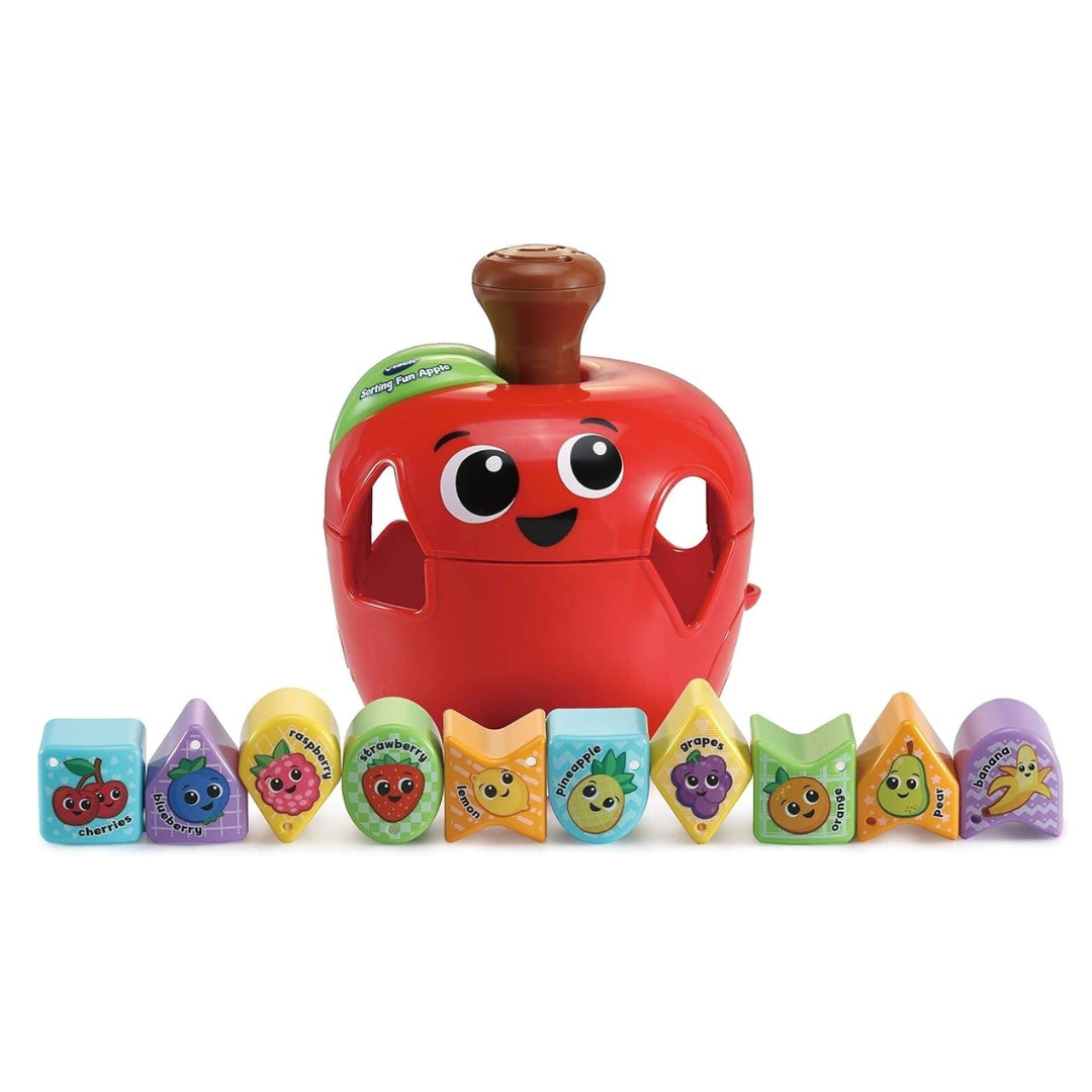 vtech Toy apple with character face and colorful shape blocks on a white background