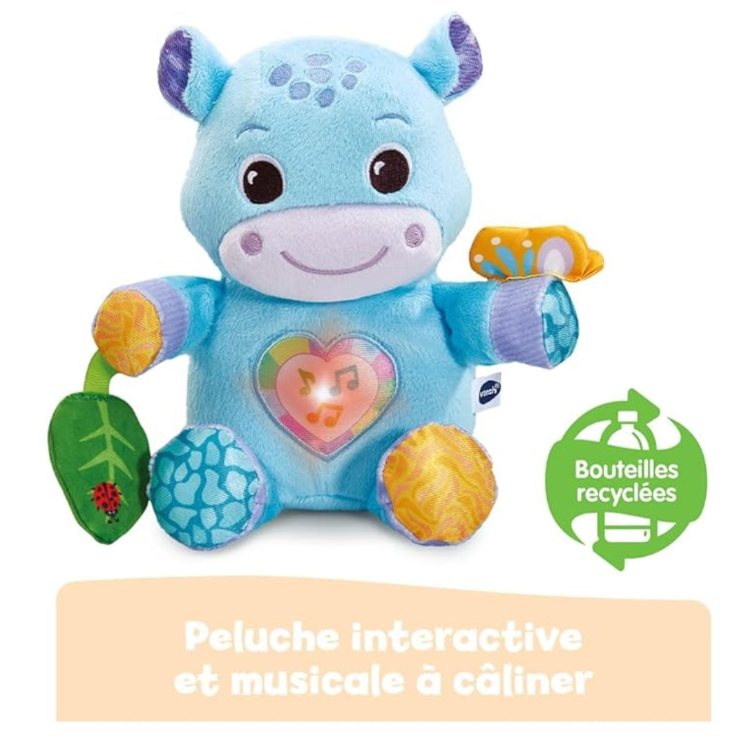 Interactive musical plush Vtech toy with recycling logo on a white background