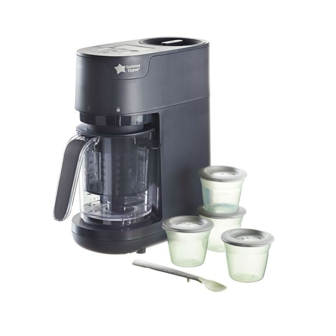 Black baby Food Maker with containers and a spoon on a white background