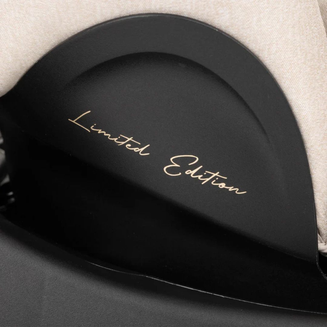 Black car Seat with 'Limited Edition' text on a neutral background