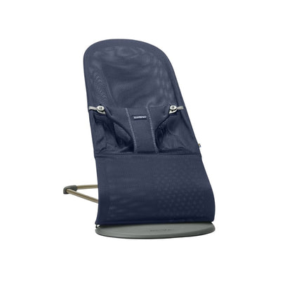Navy blue baby jorn baby bouncer with mesh design on a white background