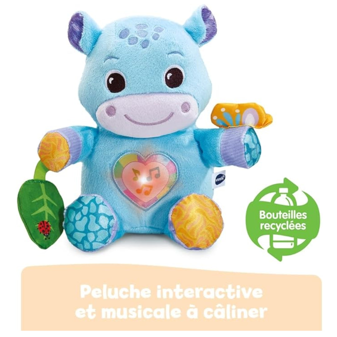 Interactive musical plush Vtech toy with recycling logo on a white background
