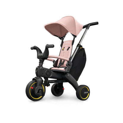 Doona Pink and black baby tricycle with canopy on a white background
