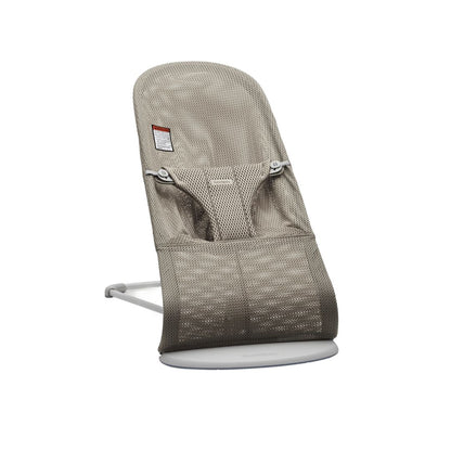 Baby Jorn Baby bouncer chair with mesh seat and white base on a white background
