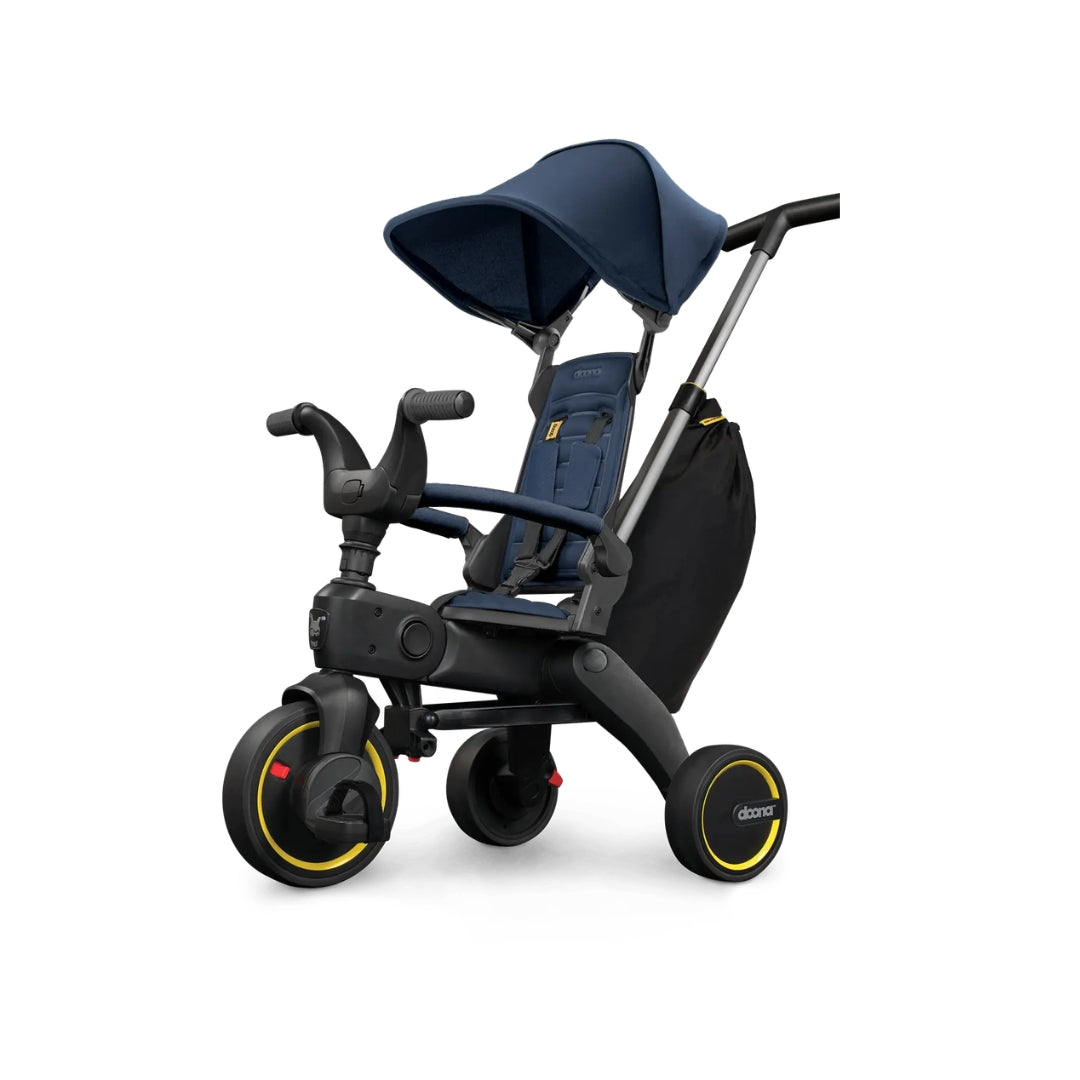 Doona Children's tricycle with canopy on a white background