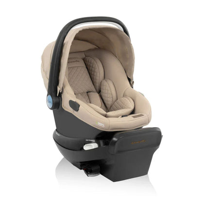 Evenflo Beige and black baby car seat on a white background